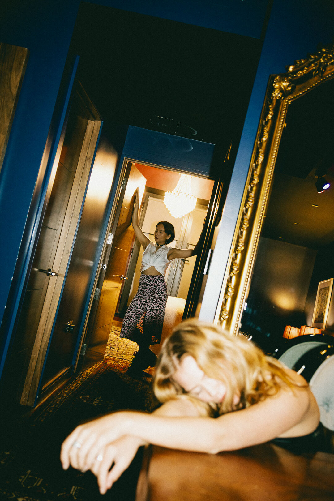 The gold-mirrored hallway at HUX Kensington